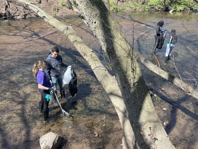 Students clean up the river on campus
