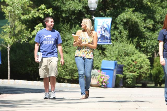 Two Kean University students on walking on campus