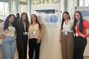 Group photo of the Neurodiverse Detectives Research Groups next to their research poster during Research Days 2024