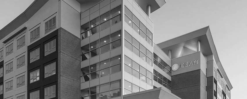 image of cougar hall at night from outside of building