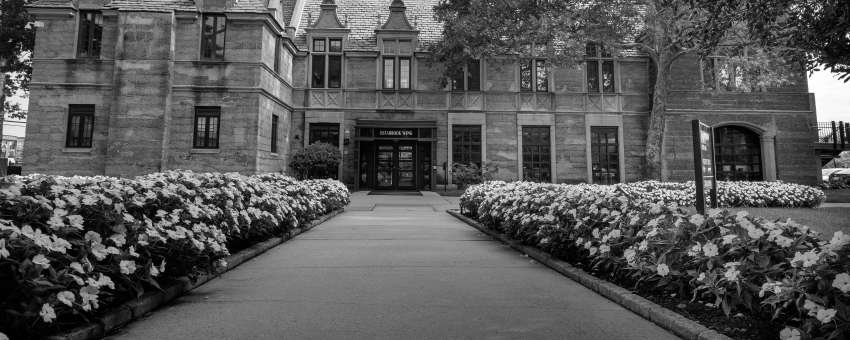 Kean Hall front entrance with flowers