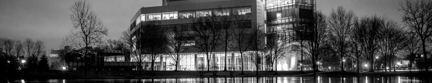 Kean's STEM building at dusk from across the pond