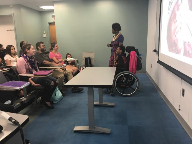 Photo of Auggie and his Mother speaking in Prof. Manheim's class