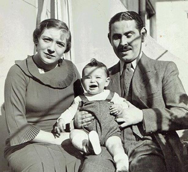 Historic photo of Peter Goldsmith as a baby with his parents