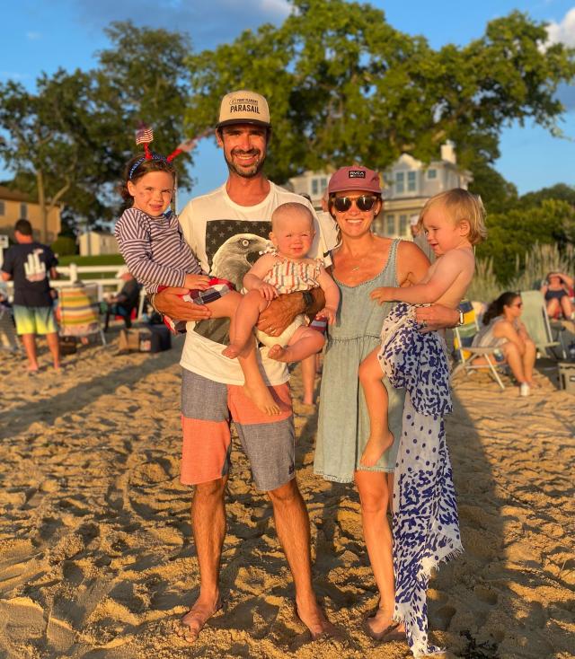 Titmas and his wife, Libby, who own Point Pleasant Parasail, pictured with their family