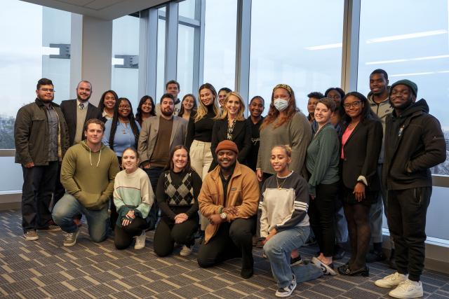 Dana Bash in a group shot with students at Kean