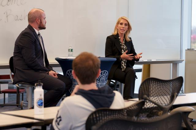 Dana Bash speaks to students in a classroom at Kean