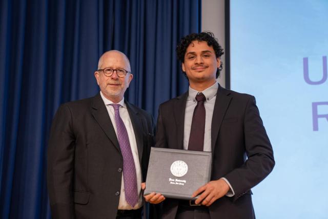 Kean Provost David Birdsell poses with Eric Landaverde