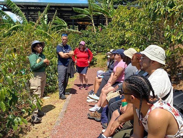 Students listen to a lecture at a coffee farm in Costa Rica