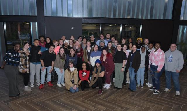 Lauren Ridloff poses with a group of Kean students