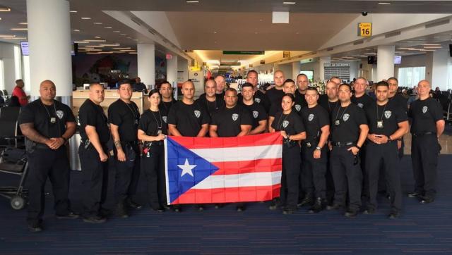 Sanchez-Gonzalez pictured with officers deployed to Puerto Rico during Hurricane Maria