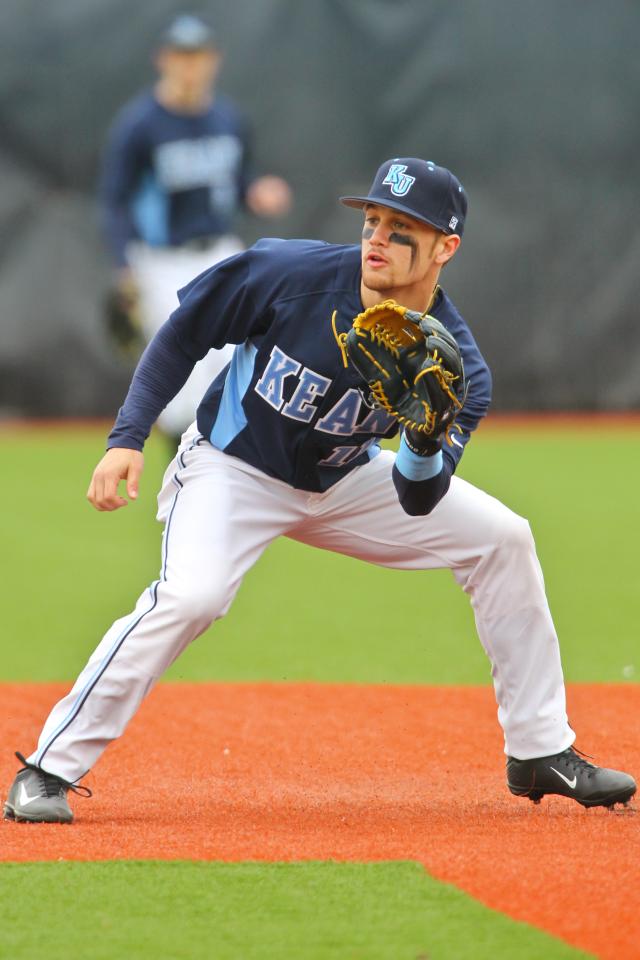 Tyler Smarslok taking the field for the Kean Cougars, where he won a National Golden Glove award.