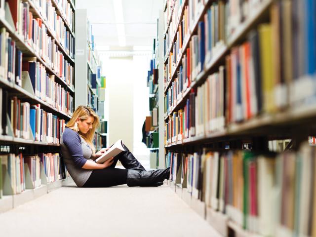 Kean University student in Library