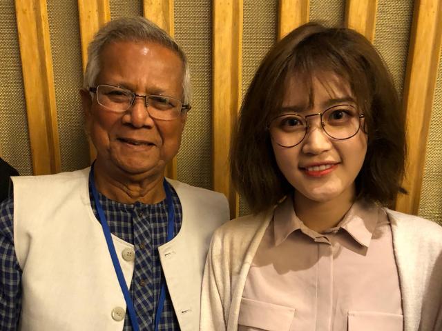 Wenzhou Kean University student Yichen Wang and Nobel Peace Prize Laureate Professor Muhammad Yunus