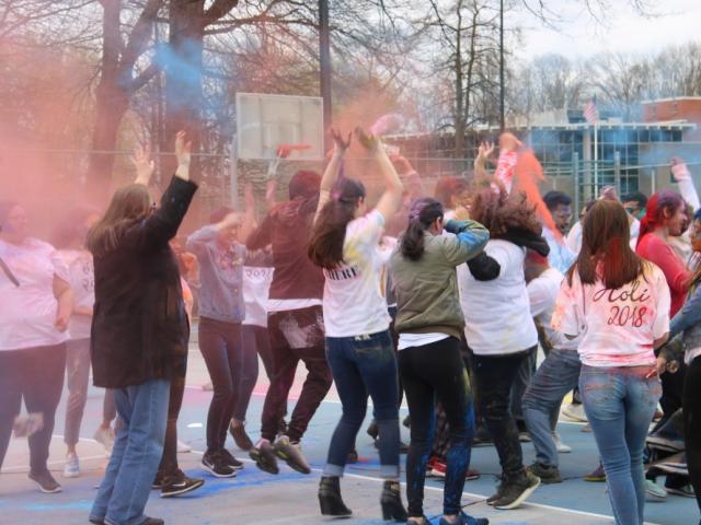 Holi Festival 2018 at Kean University, Students with spray colors dancing