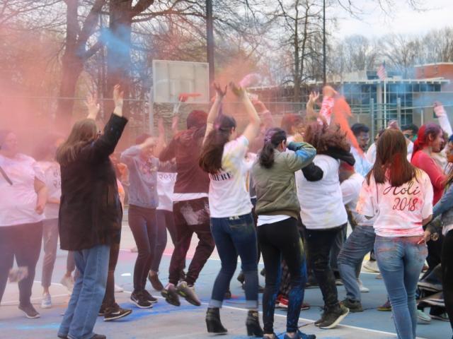 Holi Festival 2018 at Kean University, Students with spray colors dancing