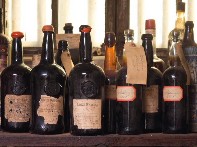 Hand written tags and labels adorned the fine of ancient Madeira wine