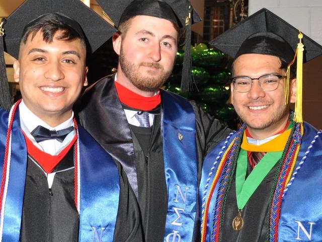 Kean students pose at their May 2018 commencement.