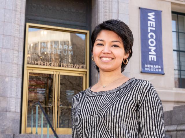 Jennifer Zuniga, Kean art history student, smiles in front of the Newark Museum