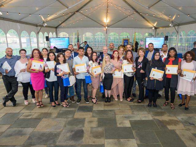 A group of new American citizens at their naturalization ceremony, held at Kean University.