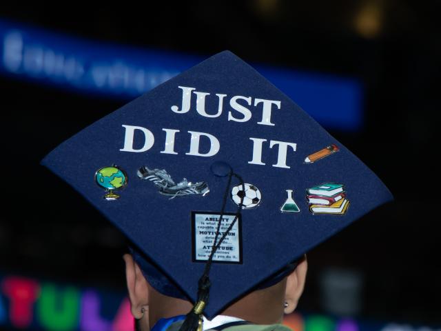 A Kean University commencement cap with the words, "Just did it."