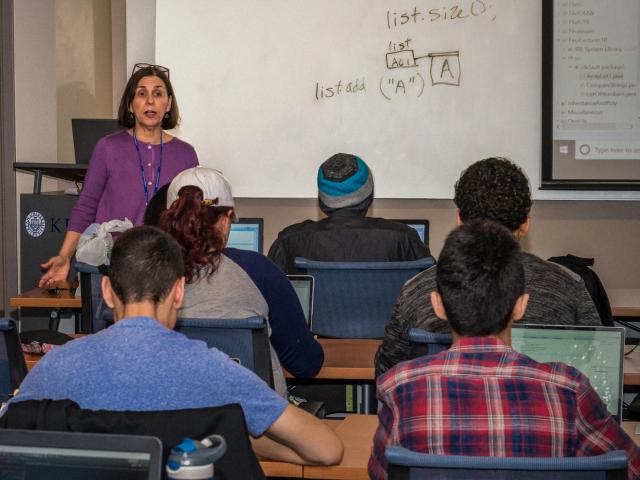 Kean University researcher Mayra Bachrach teaches a computer science class.