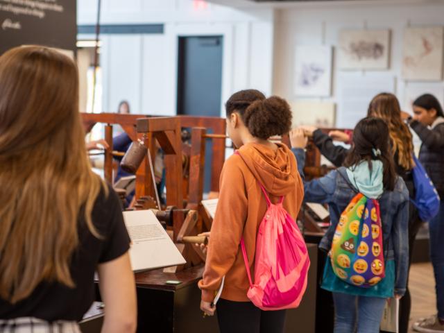 school kids try hands-on exhibits at the da Vinci exhibit