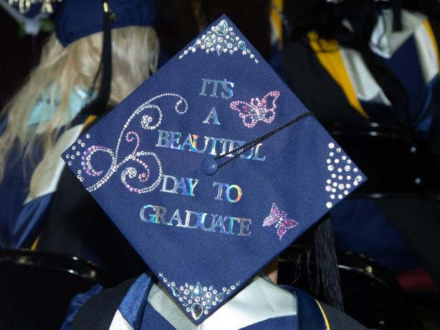 The grad caps say it, its a beautiful day to graduate