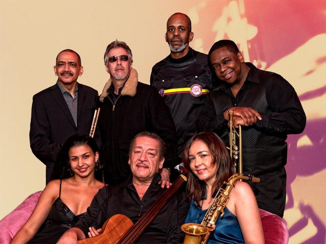 seven artists with their musical instruments