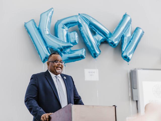 Dr. Repollet with Kean balloon letters
