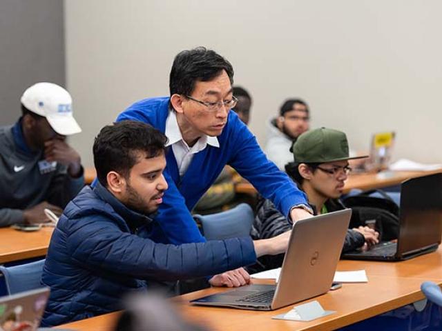 Associate Professor Jing-Chiou Liou teaching a computer science class at Kean University.