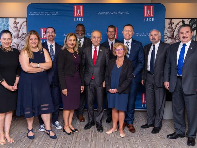 Kean President Repollet stands with a group of leaders from Hispanic-Serving Institutions.