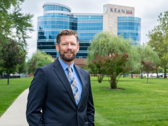 James Konopack, new dean of CHPHS, stands in front of NAAB