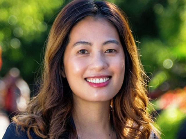 Kean professor Ngoc Dao, an Asian woman with long brown hair