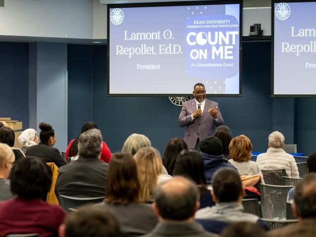 Kean President Lamont Repollet, Ph.D. speaks to the crowd at the Midyear Convocation