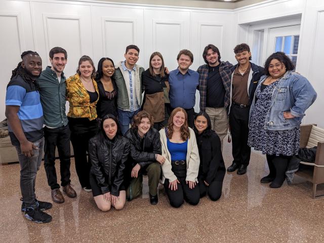 A group of Kean students and recent alumni pose on East Campus.