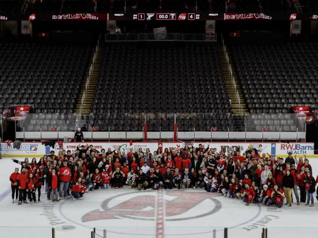 Attendees at the ASL Night celebration got to walk on the ice after the game.