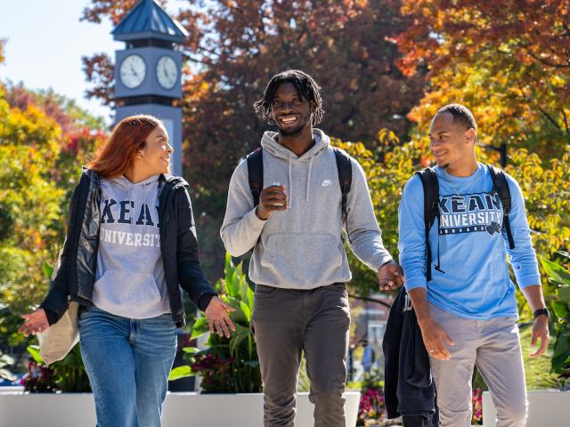 Kean students walk near the clock tower