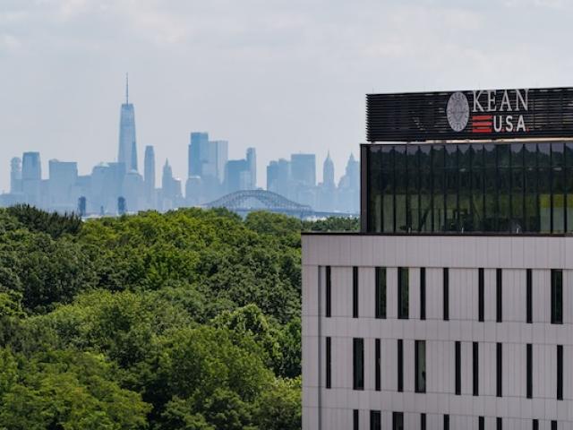 Hynes Hall with a view of the New York City skyline