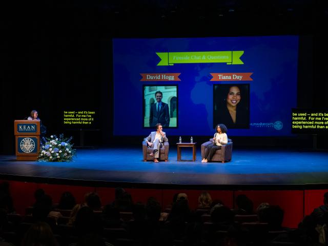 David Hogg and Tiana Day are seated on stage at the Human Rights Conference