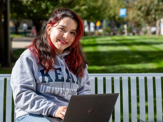 Student Sitting on Bench