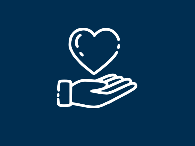 A hand holding a heart