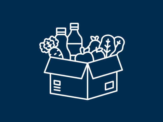 An assortment of produce inside a cardboard box