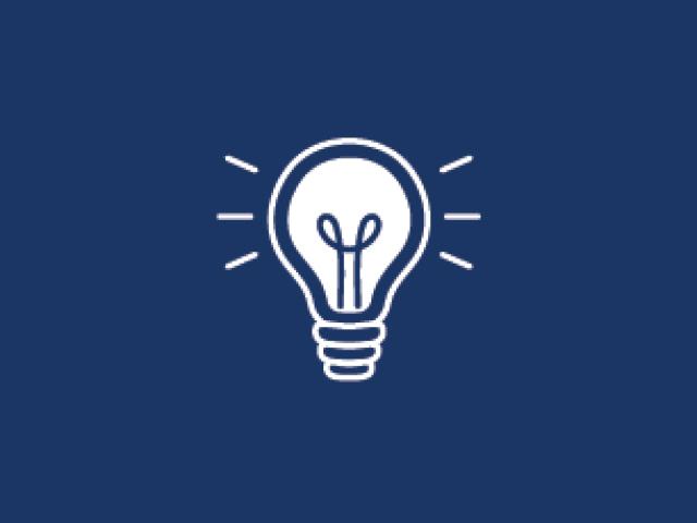 An icon of a lightbulb against a blue background