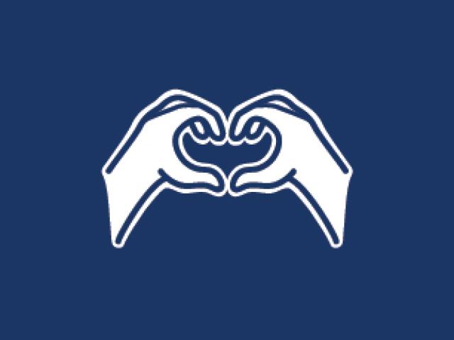 Two hands forming the shape of a heart