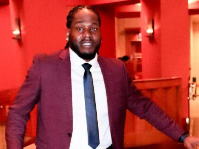 Man standing in a suit