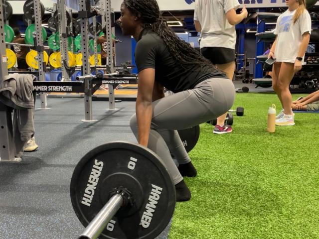 Woman lifting a weight
