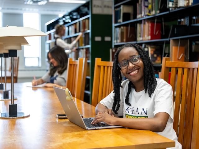 A Kean student visits the library