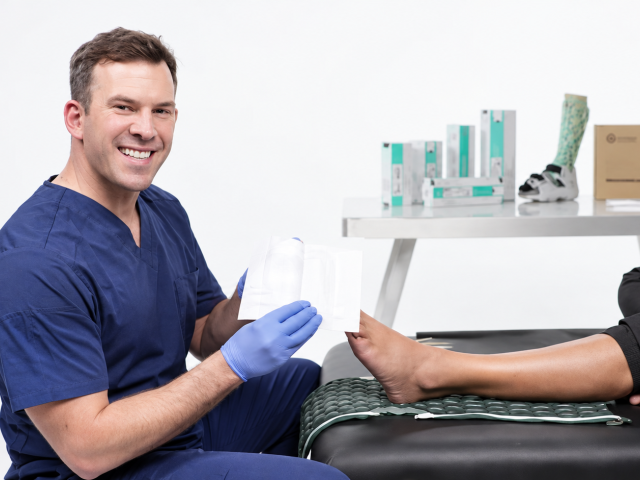 Clinician holding a brace