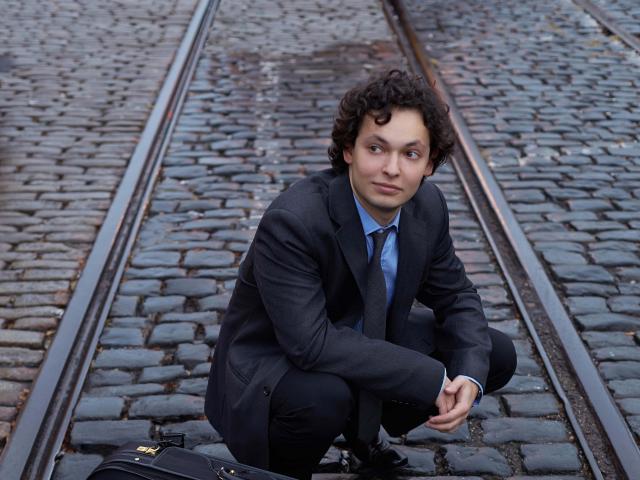 a person sitting on a bench